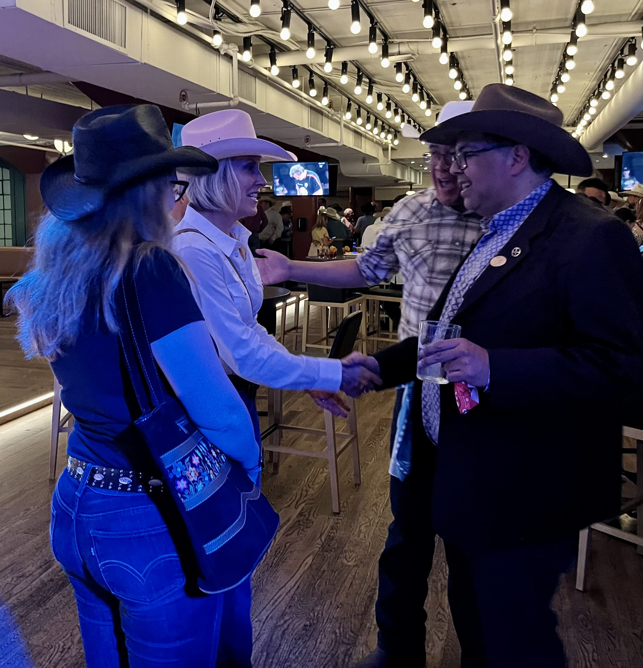 Tracey and Jenn with Naheed Nenshi, Leader of the Alberta NDP at the Alberta’s Industrial Heartland Association Stampede event.